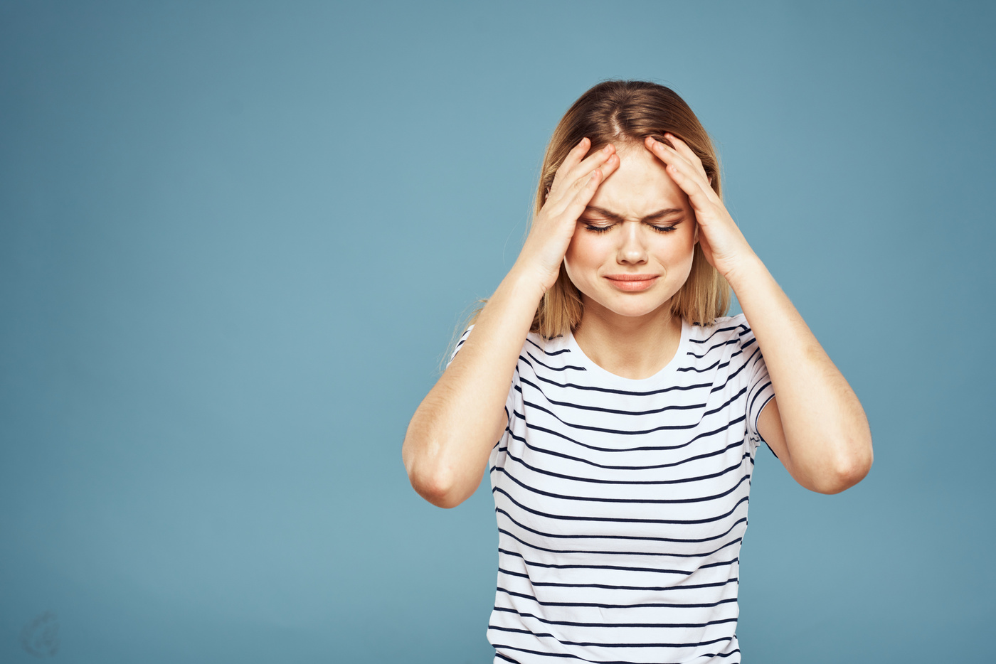 Emotional Woman Striped T-Shirt Lifestyle Cropped Blue Background